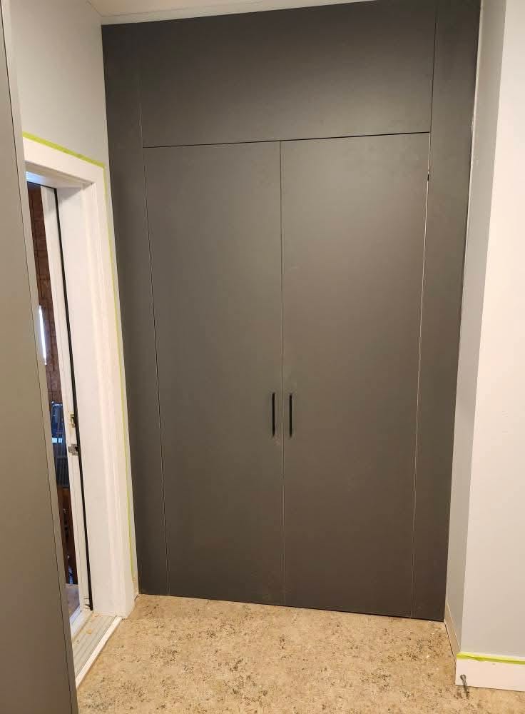 Custom built-in closet doors — handcrafted by Winnipeg Renovation