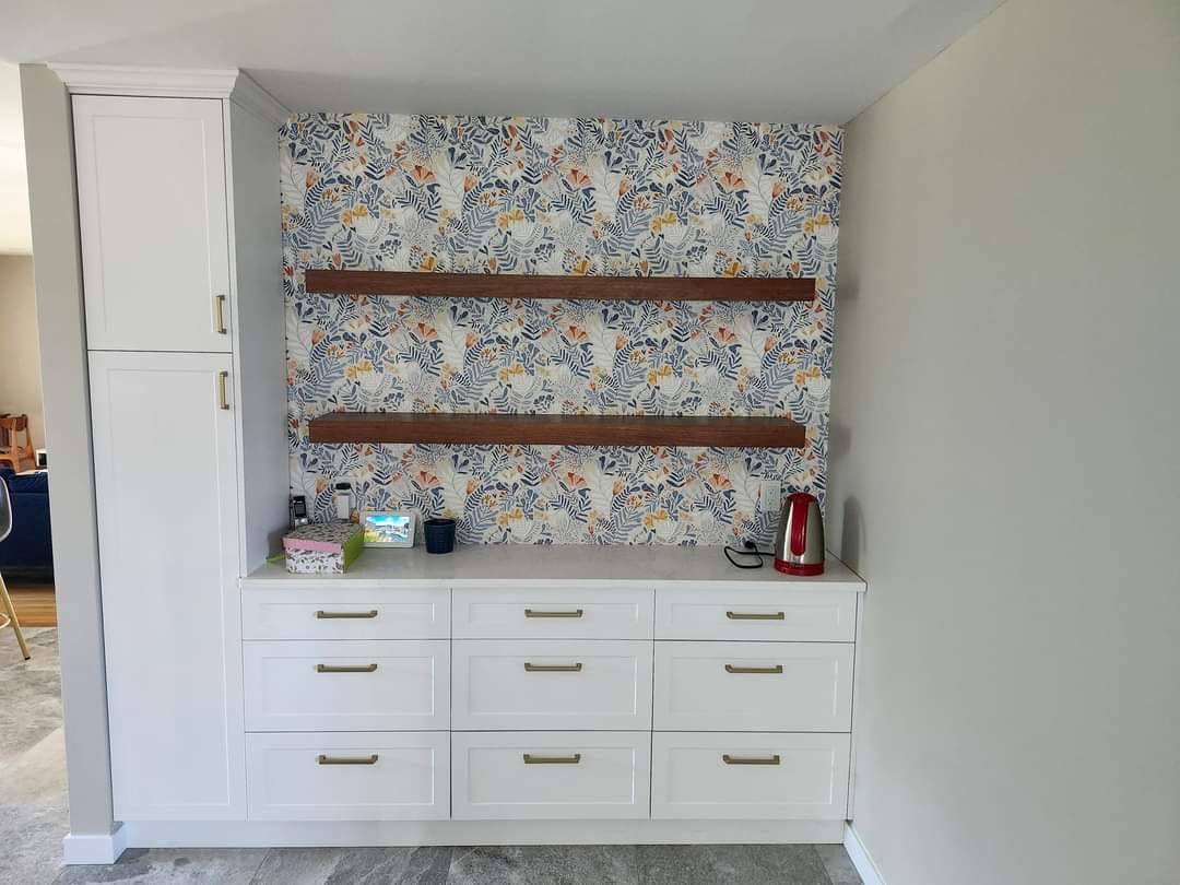 Custom coffee bar and built-in shelving for Fort Garry home